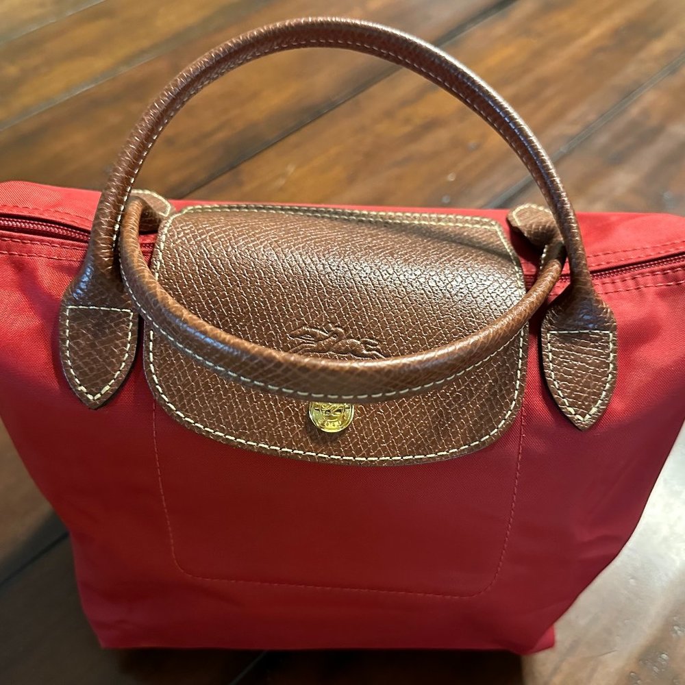 TWO mini Longchamp top handle handbags